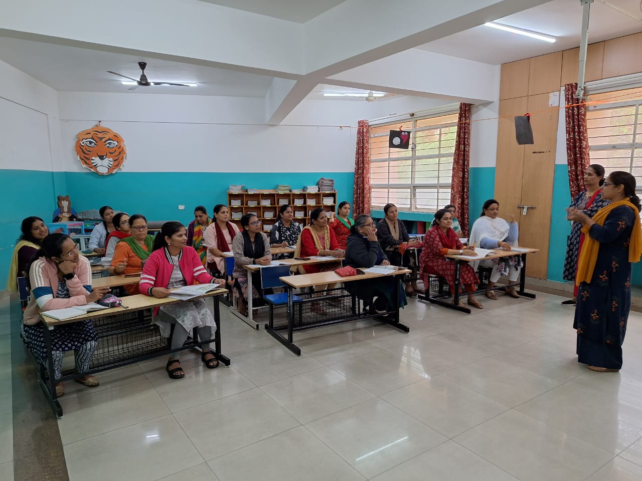 NTT training session — adult learners in classroom
